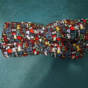 Pet Dog Bolster Bed Fot Travel in Black Colorful Print
